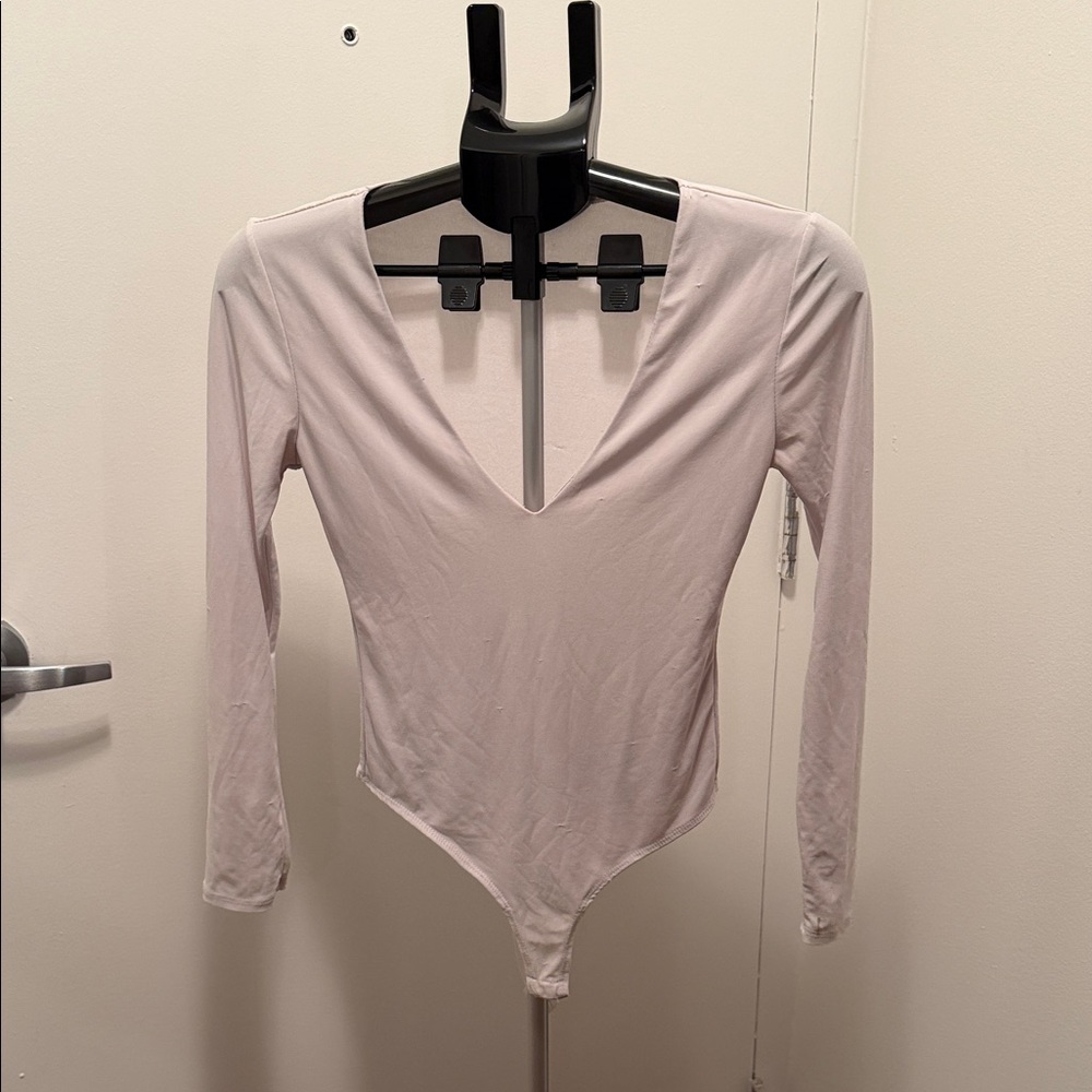 Elegant Cream Long Sleeve Bodysuit